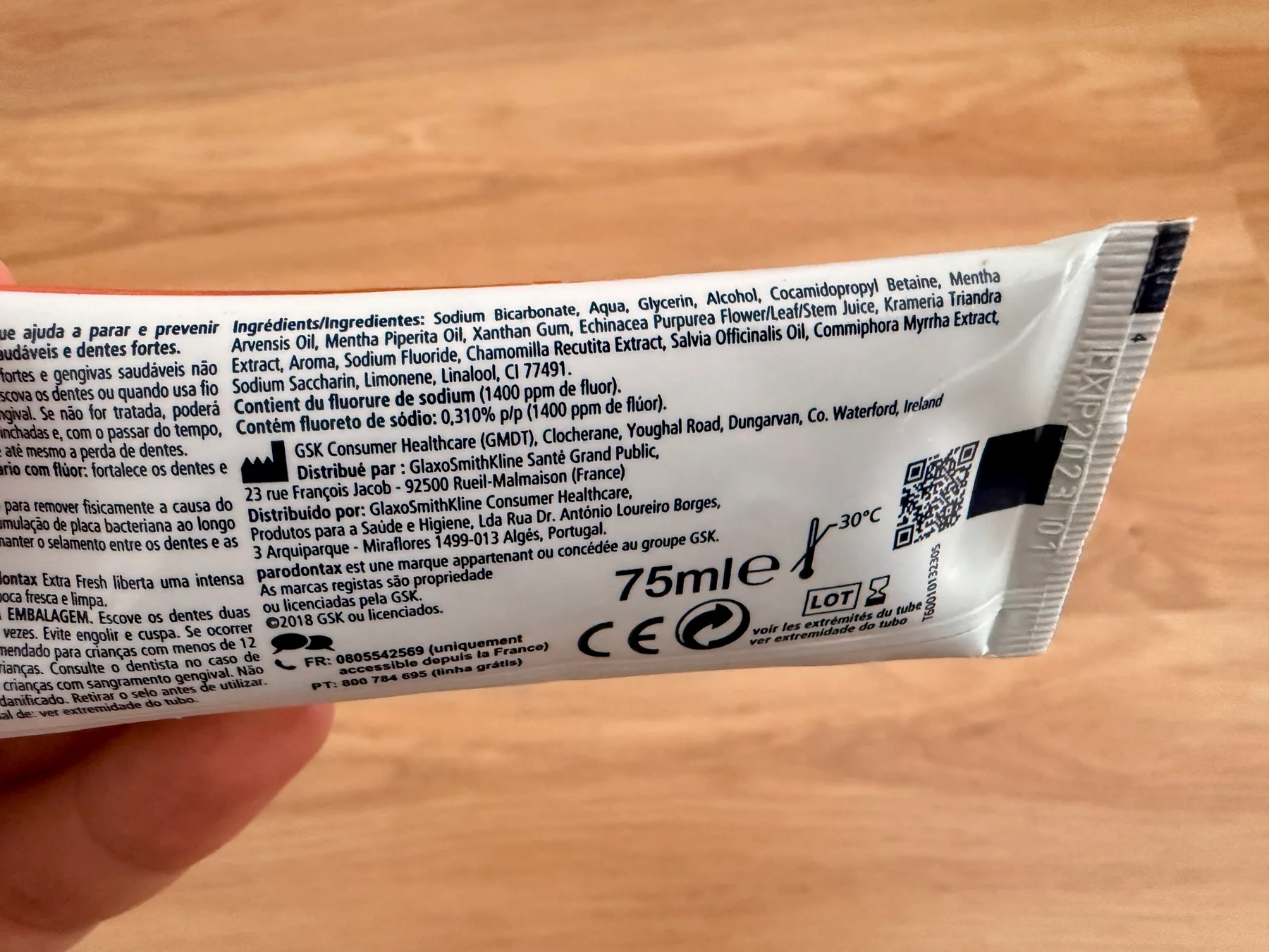 Ingredient panel on an old tube of Parodontax Extra Fresh showing sodium bicarbonate first and 1,400 ppm fluoride