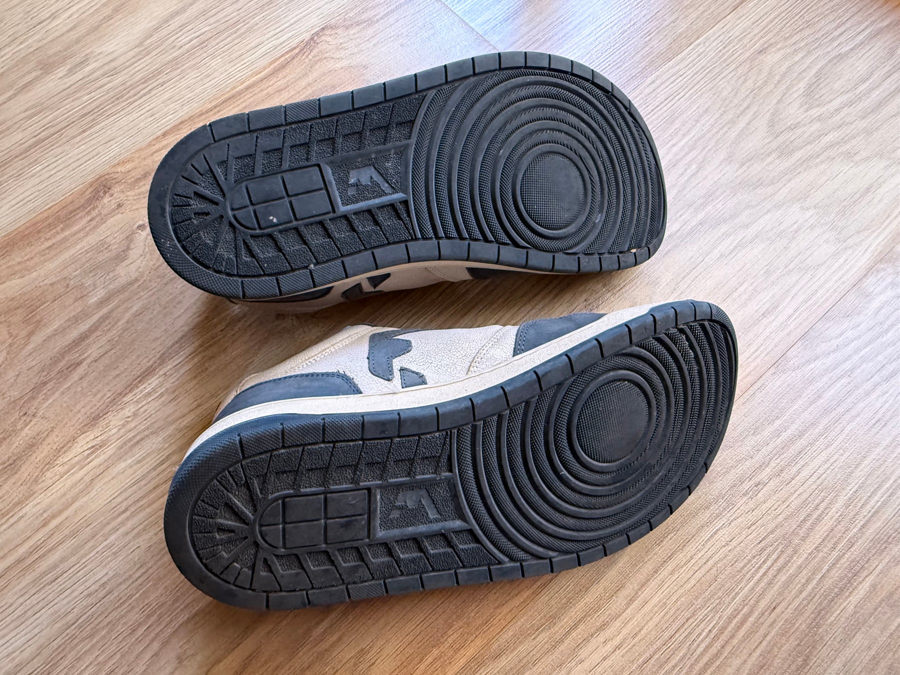 Rubber outsoles of two WYDE Nova shoes after ten months of regular use